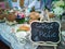 Eco friendly urban picnic at the park. Tablecloth, recycled plates, healthy food and accessories