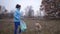 Eco friendly woman picking up litter outdoors