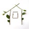 Eco house: symbol for green building and nature architecture. Symbol of the house is lined with green twigs with leaves.