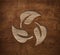 Eco leaves recycling triangle symbol engraved in wooden board