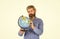 Eco movement. Geography teacher. Earth globe. Pick next destination point. Travel and wanderlust. Bearded man with globe