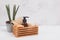 Eco natural bathroom accessories, natural cosmetics products and tools in wooden box