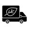 Eco truck solid icon. Lorry with eco cargo vector illustration isolated on white. Earth with arrows symbol glyph style