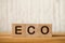 Eco word written on wood block. Eco friendly and sustainable environment concept