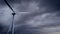 ecologic windmill on heavy clouds backdrop, fictional design - industrial 3D illustration