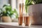 Ecological bamboo toothbrushes in bathroom. Eco friendly wooden toothbrushes in a cup on blurred window background. Generative AI