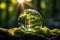 Ecological brilliance Earth sphere crystal on green moss nature background