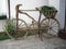 Ecological handmade bike made with pieces of wood logs ornament