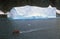 Ecological tourists in inflatable Zodiac boat in Errera Channel at Culverville Island, Antarctica