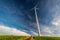 Ecological wind turbines in a meadow as alternative energy