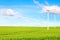 Ecology concept. windmills, field and beautiful sky. Renewable energy sources