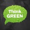 Ecology Think green speech bubble on dark background