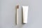 Ecology toothbrush on grey background. Brush on table. Sustainable mouth product