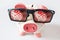 Economy and finance - piggy bank with glasses and dreamed low pr