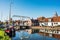 Edam old town, Netherlands. Picturesque canal with boat in Waterland district near Amsterdam.