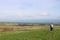 Eden valley from fellside footpath with walker