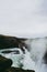 The edge of the Gullfoss waterfall and splashes flying over