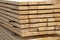 Edged boards in stock, ready for sale. Warehouse of construction materials