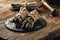 An edible, raw stems of asparagus on a wooden background.