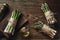 An edible, raw stems of asparagus on a wooden background.