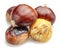Edible sweet chestnuts with roasted chestnuts isolated on white background