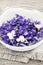 Edible violets in bowl