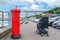 Edinburg, Scotland - August 26 2015: Man in wheelchair passes letter box at Forth bridge