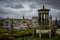 Edinburgh City and Castle, Scotland, viewed from Calton Hill on a cloudy afternoon with the Dugald Stewart monument in