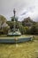 Edinburgh Scotland England. View of Edinburgh Castle and the fountain.