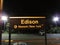 Edison train station sign at night, Edison, NJ USA.