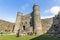 Editorial, Interior of Harlech Castle with towers, gatehouse and tourists
