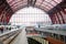 Editorial picture of people travelling by train in the Antwerp Central station