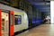 Editorial picture of people travelling by train in the Antwerp Central station