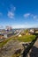 Editorial, Port of Holyhead with wind turbine installation vessel in distance, wide angle, copyspace to right, portrait