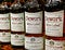 Editorial selective focus photo of Dewar`s White Label Scotch Whisky bottles - a brand of blended Scotch whisky