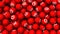 Editorial shot: filled screen 3D rendering red balls with icon pinterest. Round spheres with the logo of the social