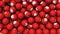 Editorial shot: filled screen 3D rendering red balls with white icon Tinder. Round spheres with logo of the social