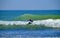 Editorial surfer girl on Ditch Plains beach Montauk New York