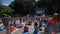 Editorial video people yoga classes during the Feast Day of Yoga in the park on a fitness mats. Belarus, Minsk, 19 June 2016