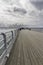 Editorial, Wide angle of pier and with hand rail in foreground, Beaumaris, United Kingdom