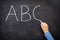 Education concept - ABC alphabet school blackboard