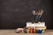 Education concept - books on the desk in the auditorium