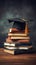 Education concept graduation cap on stack of books over blackboard