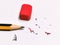 Education concept. Red rubber eraser and a pencil with dust.