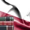 Education concept - Stack of books and reading glasses against National flag of Poland