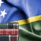Education concept - Stack of books and reading glasses against National flag of Solomon Islands