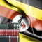 Education concept - Stack of books and reading glasses against National flag of Uganda