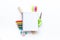 Education mockup with pupil`s stationery and textbook on white background top view