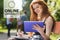 Education and online university text and woman looking at a tablet