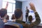 Education process at professor`s lecture in audience. Young male teacher giving presentation for students in a lecture hall